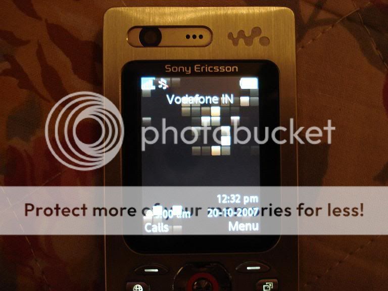Sony Ericsson W880i in a gold coat