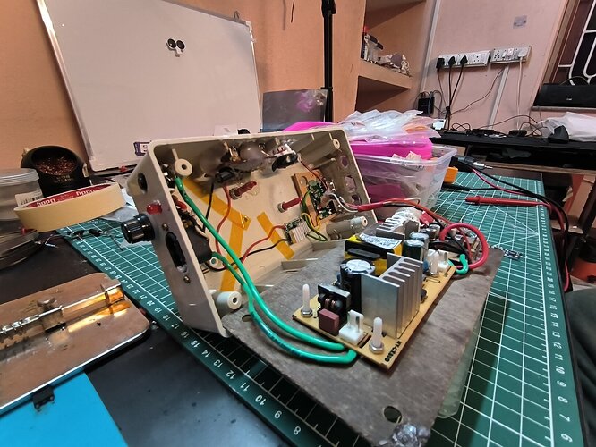 Inside of USB power hub box from sideways with connector, indicator, switch